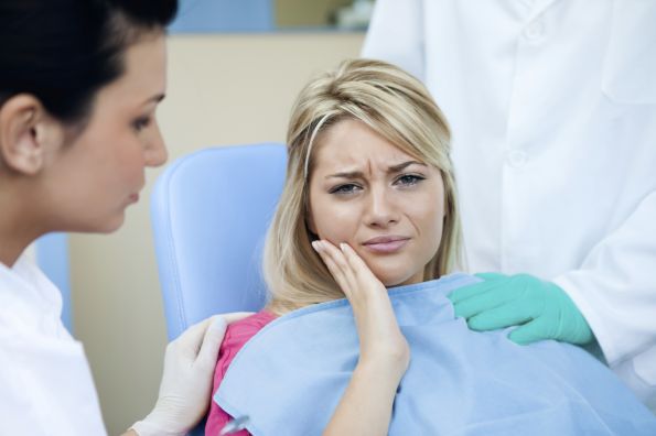 flemon dental molestias en paciente